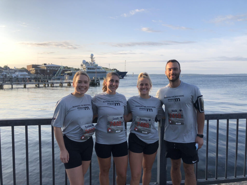 Four runners on the seaside Falmouth road course